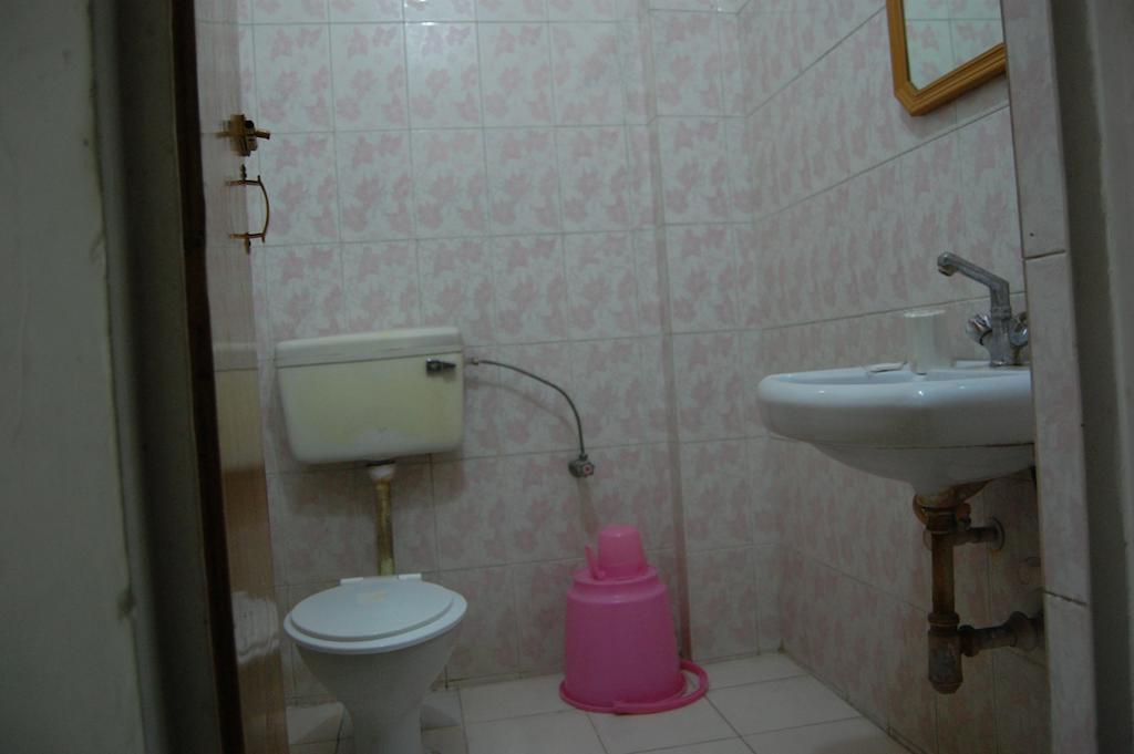Puja Guest House Варанасі Номер фото
